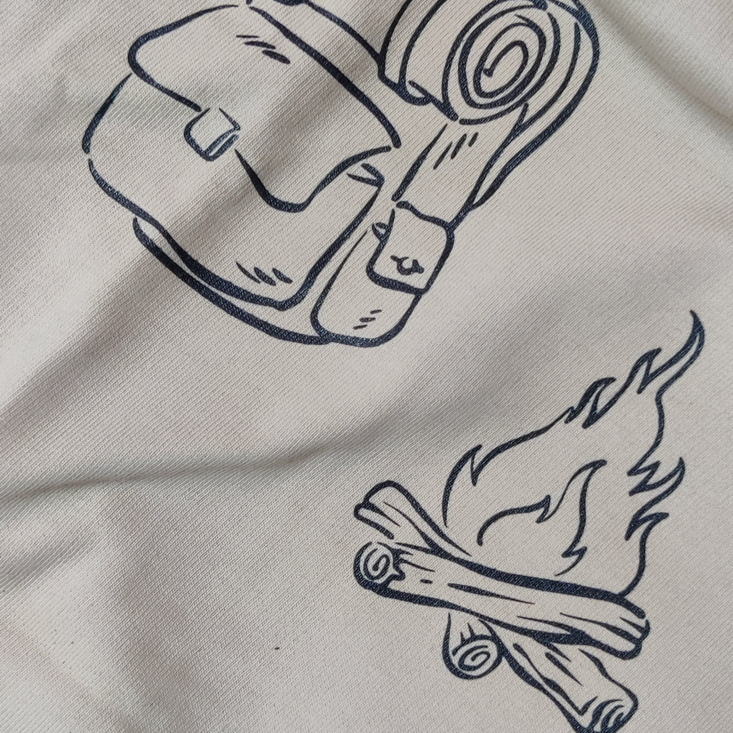 Adventurers assemble oversized T-shirt