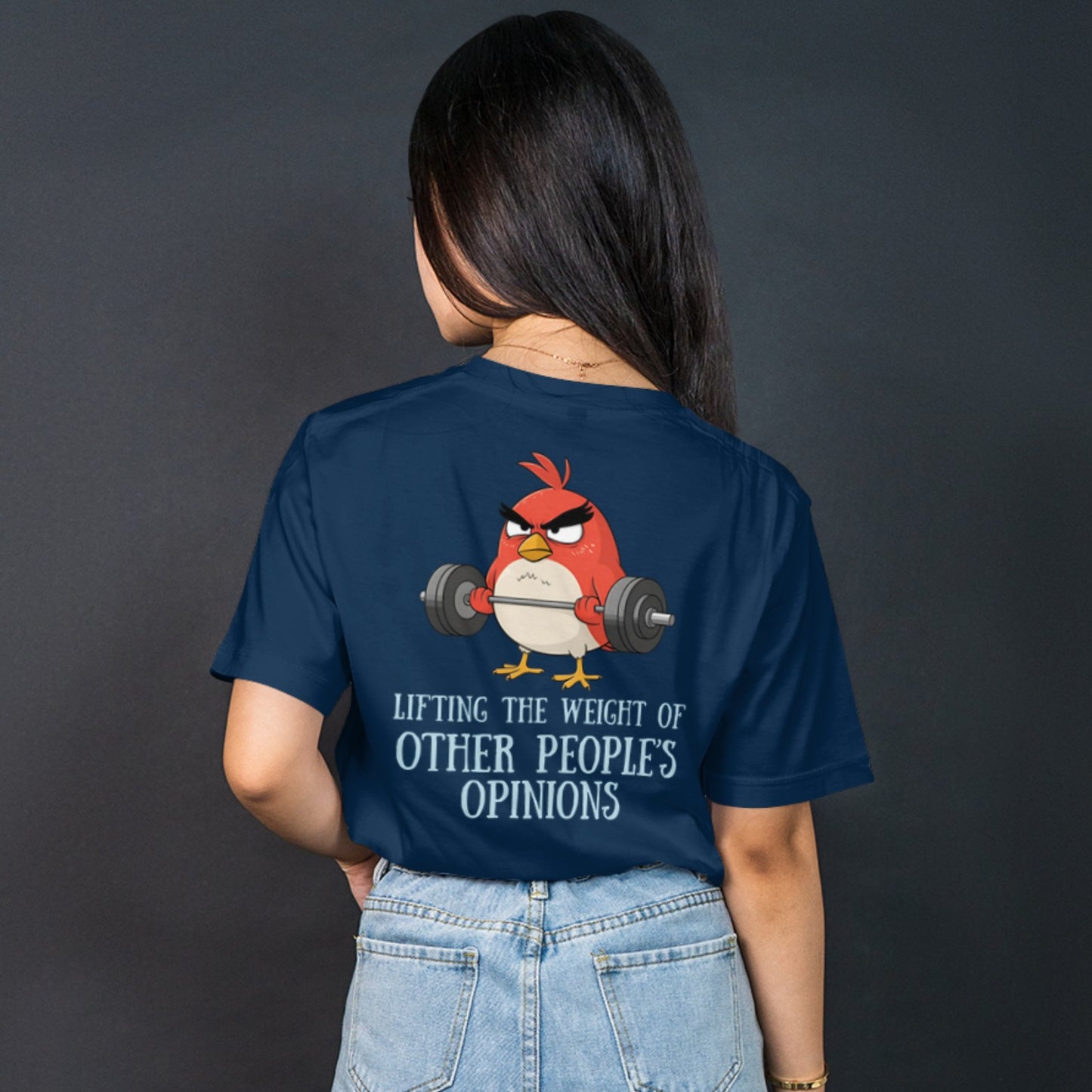 Woman wearing navy blue unisex graphic t-shirt with quote “Lifting the Weight of Other People’s Opinions”