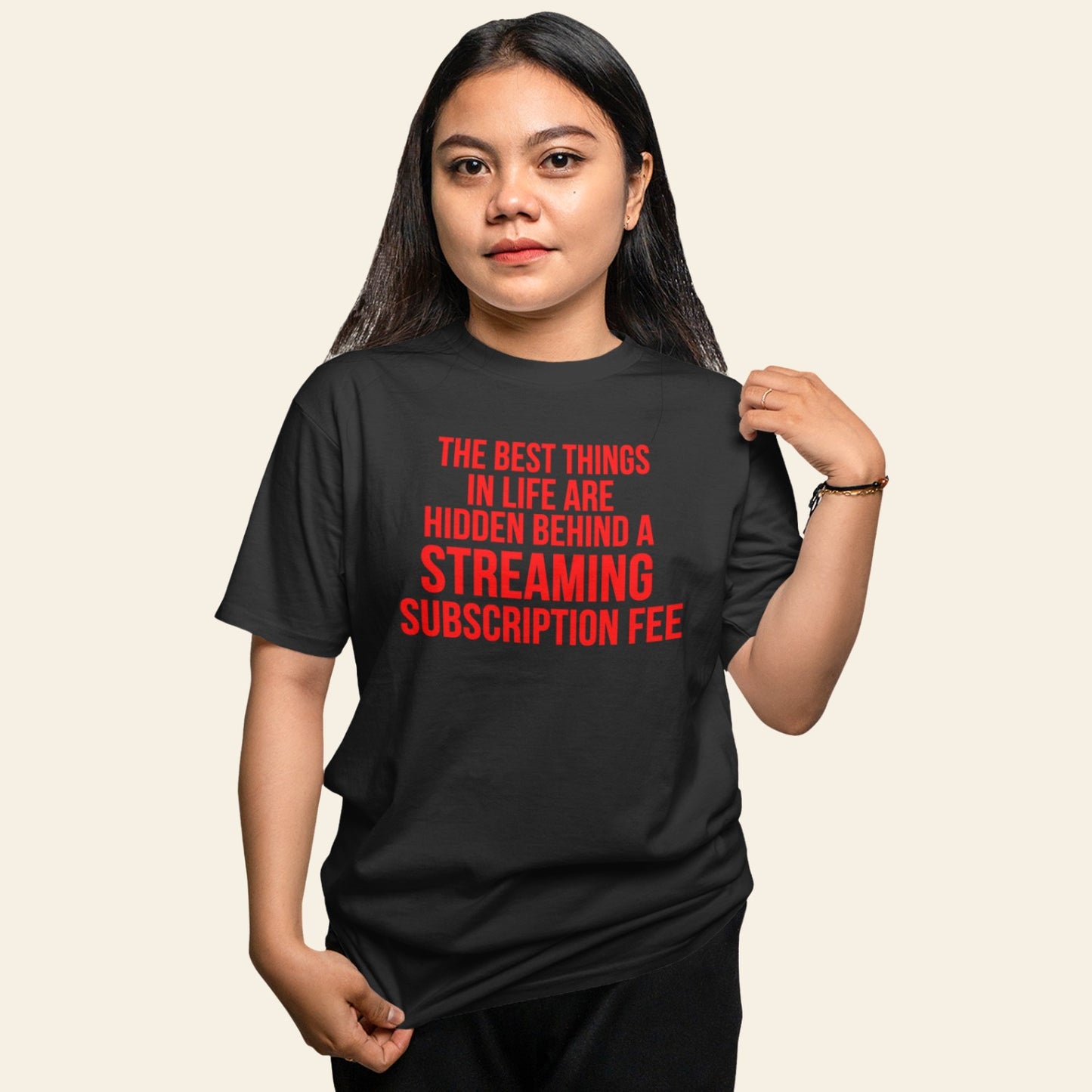 Witty red text t-shirt about streaming subscriptions and capitalism