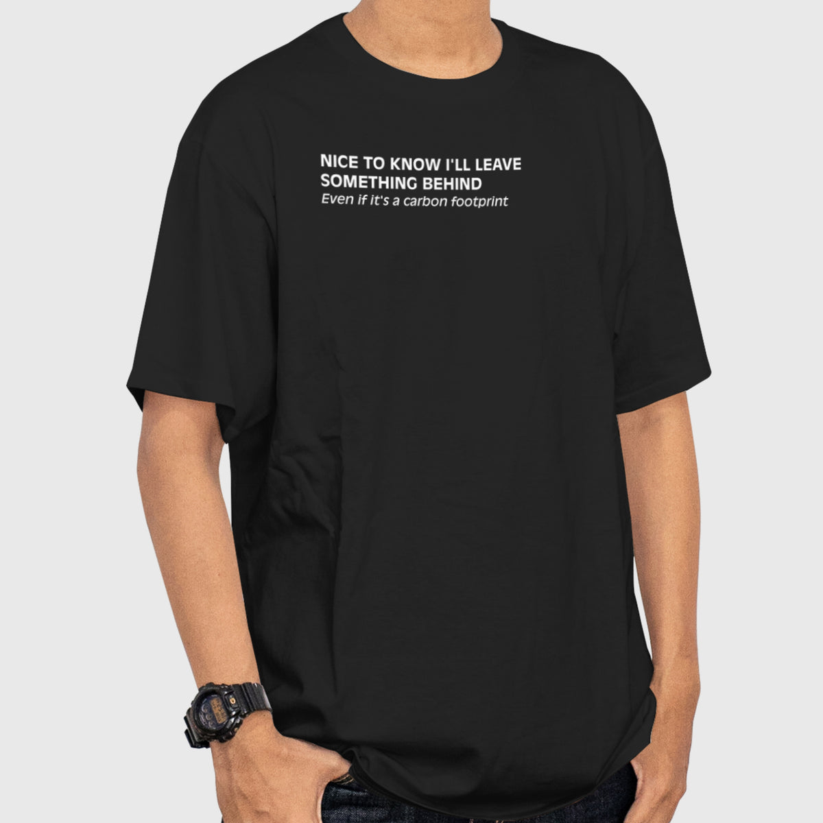 Close-up of minimalist text-based design on a black T-shirt with a dark environmental humor theme