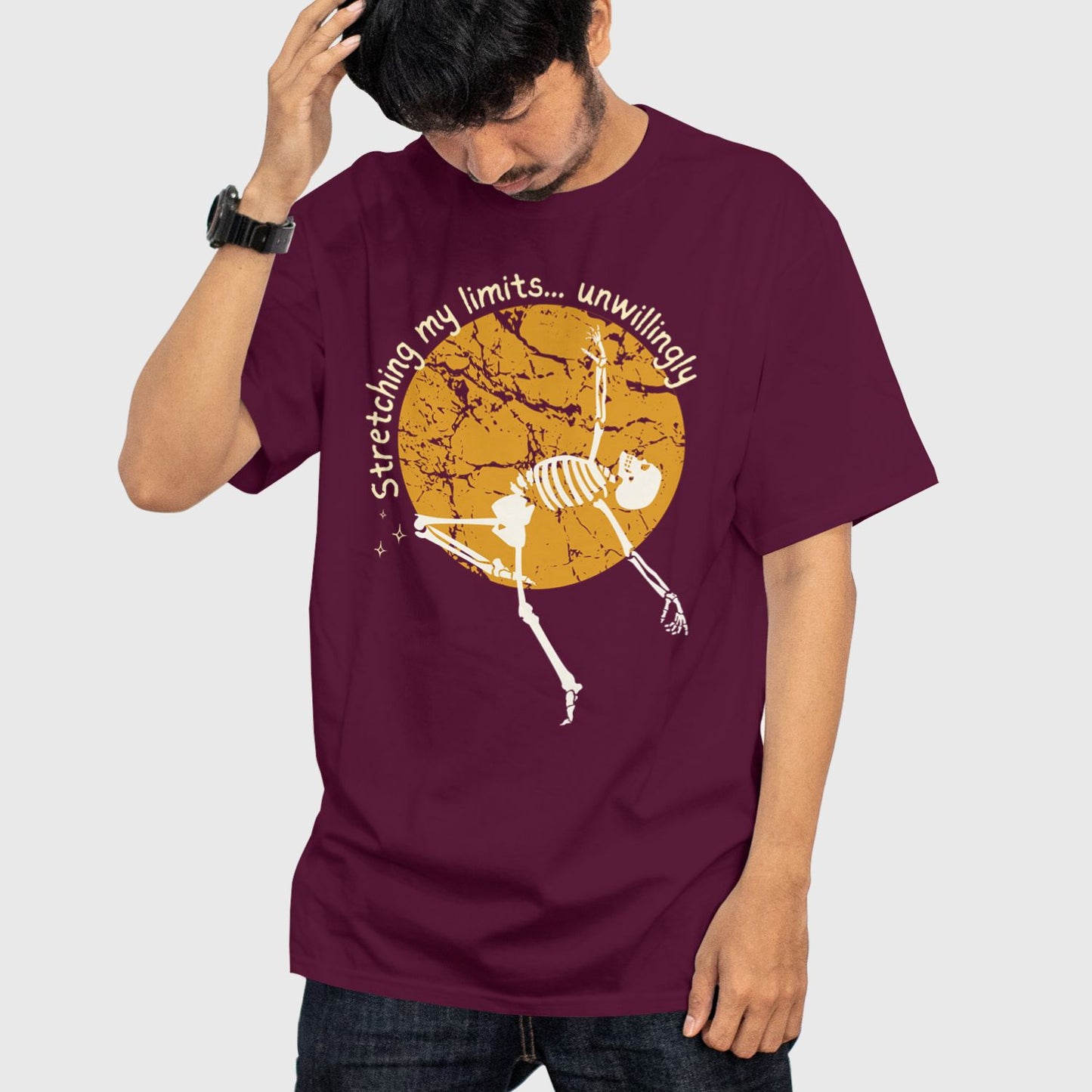 Person wearing a funny oversized t-shirt that says “Stretching Limits” – perfect for introverts and quiet rebels.