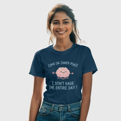 Model wearing a funny relatable women’s t-shirt with the quote “Come on Inner Peace, I don’t have the entire day” from The Grumpy Ninja’s Moodwear Collection.
