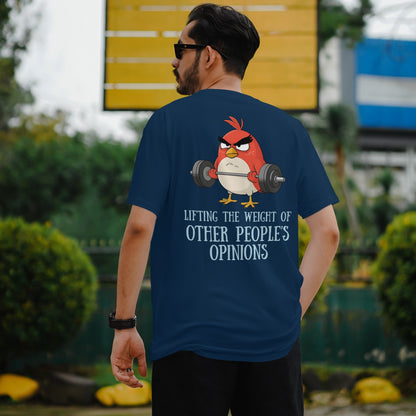 Model wearing “Lifting the Weight of Other People’s Opinions” funny oversized t-shirt by The Grumpy Ninja.