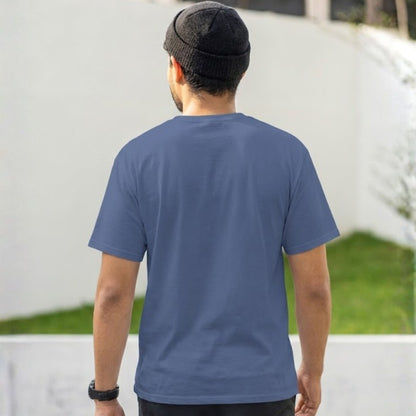 Close-up of minimalist text print on an oversized quote t-shirt that says “Motivation sold separately.”