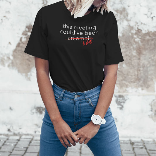 Woman wearing a black corporate-themed T-shirt about unnecessary meetings