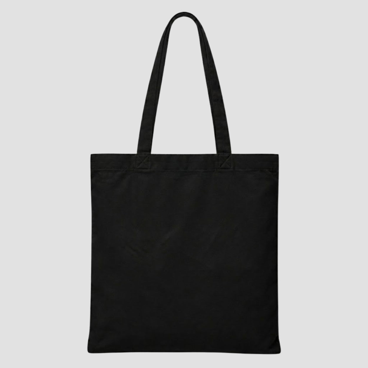 the back side image of a black tote bag