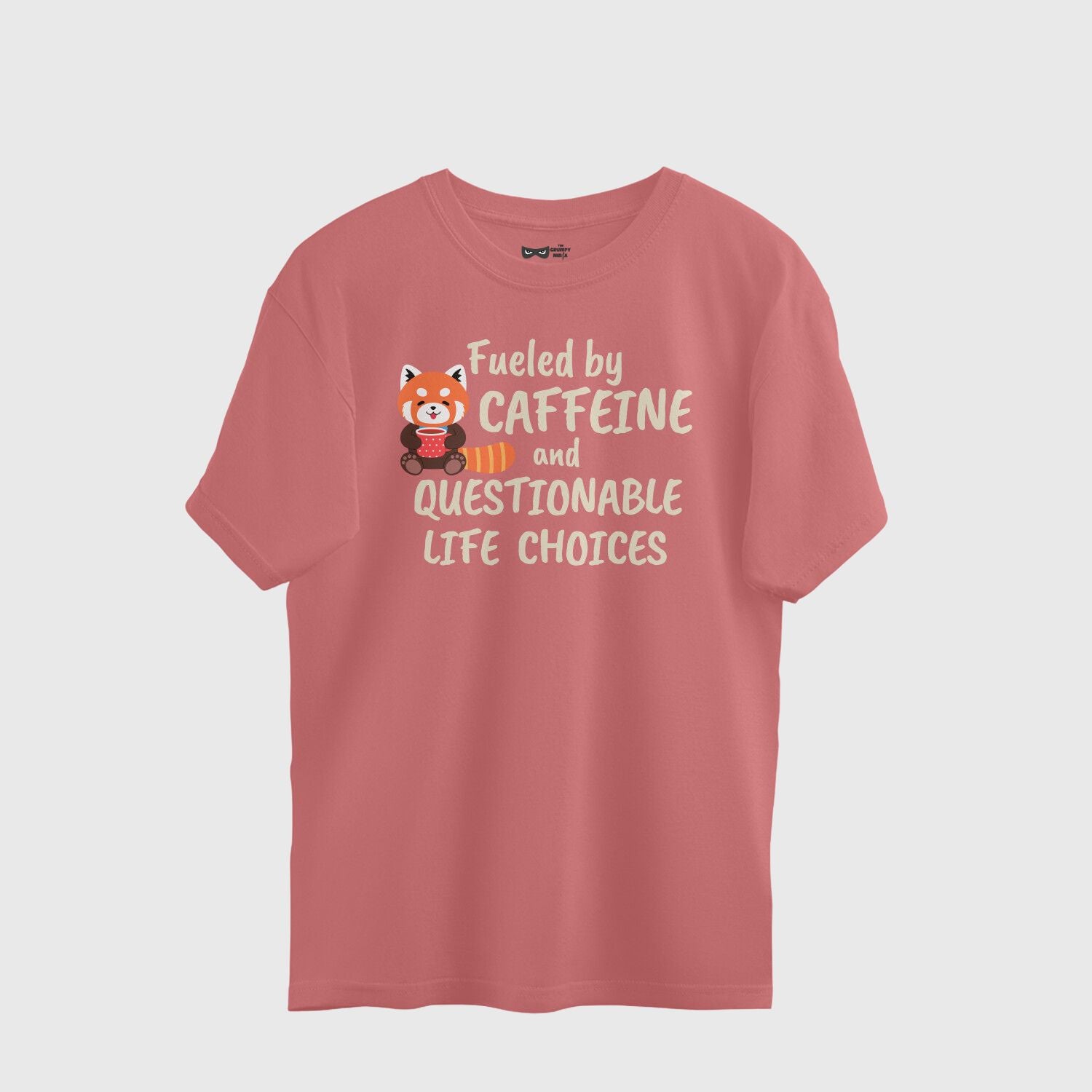 Flat lay of “Fueled by Caffeine” graphic coffee tee made of soft cotton — perfect for caffeine lovers and sarcasm enthusiasts.