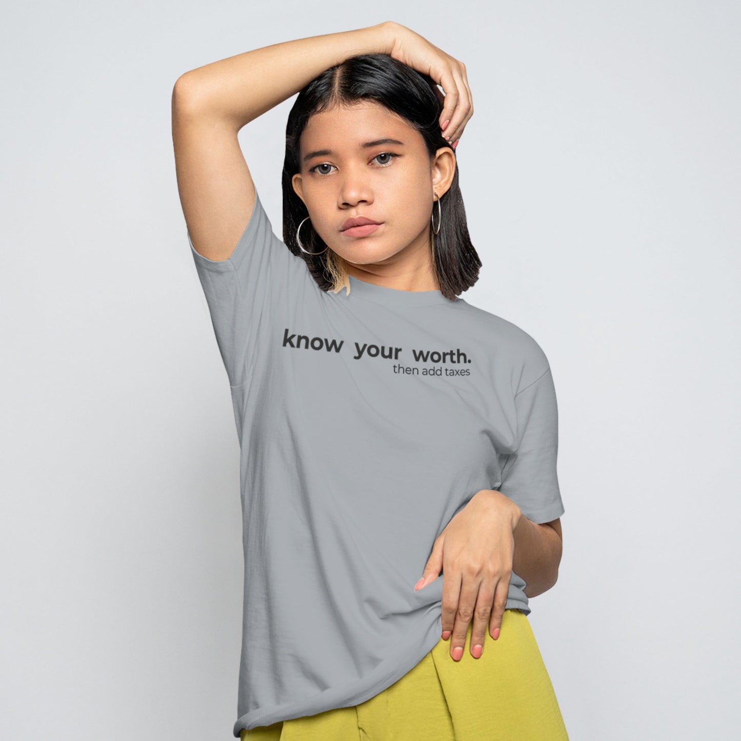 minimalist sarcastic t-shirt with the quote “know your worth then add taxes.”