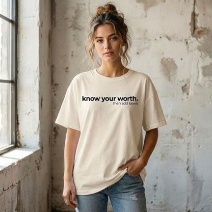 Off-white funny quote t-shirt with “know your worth then add taxes,” minimalist unisex graphic tee.