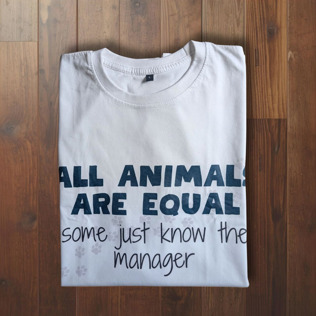 Orwell inspired t shirt with witty quote about favoritism and modern dystopian humor