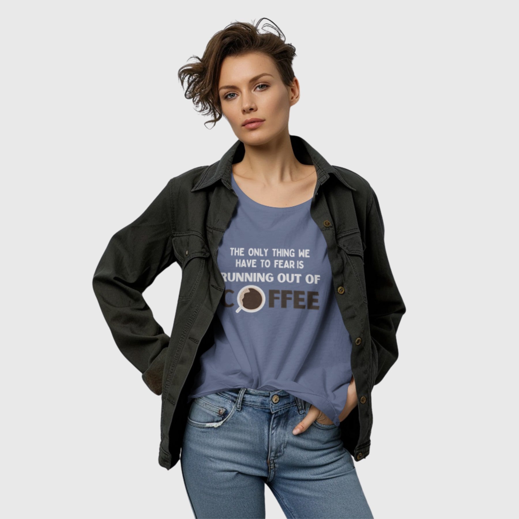 Woman wearing silver-blue coffee quote t-shirt with text “The Only Thing We Have to Fear Is Running Out of Coffee.”